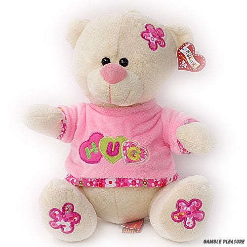 Cuddly bear white with pink clothing and text hug
