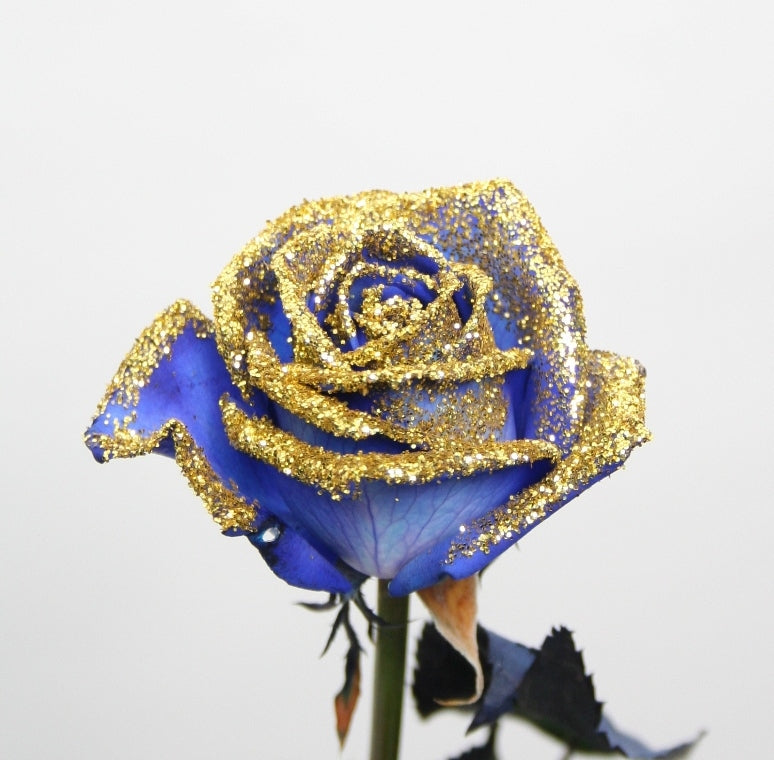 Roses bouquet of blue roses with golden glitter